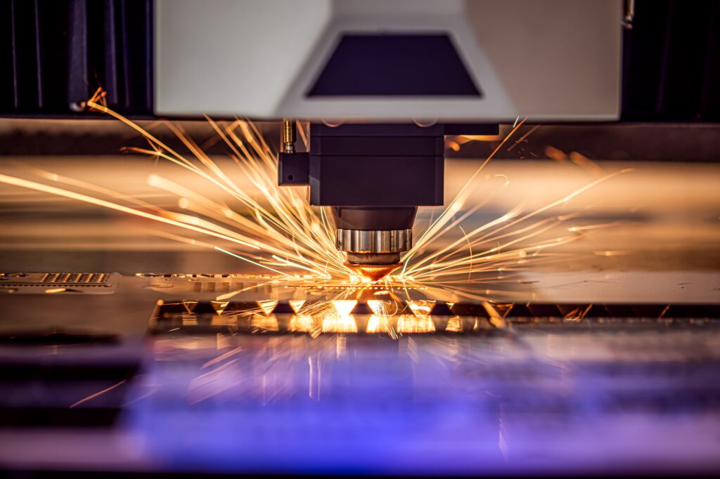 CNC Laser cutting of metal, modern industrial technology.